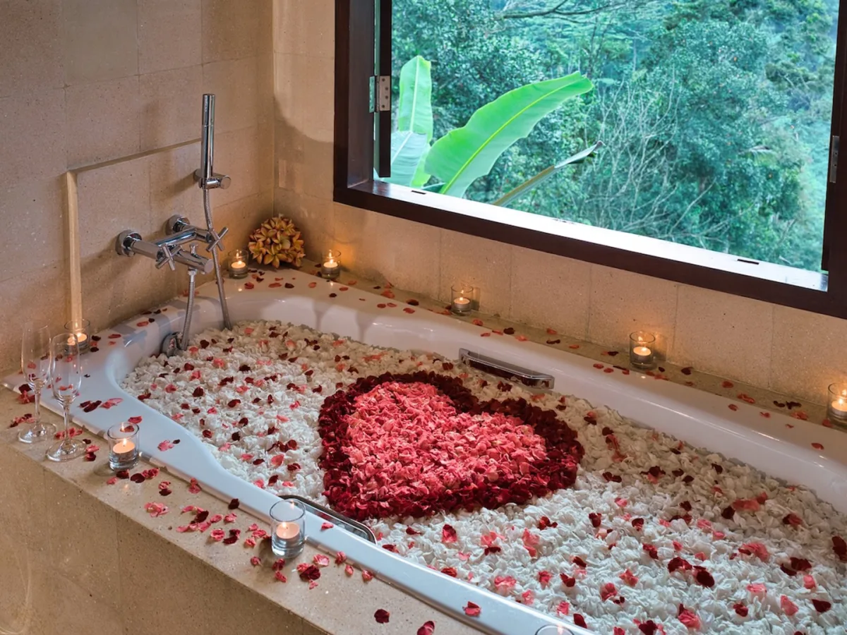 Romantic flower bath with candles inside the Sunrise View Villa in Ubud, Bali